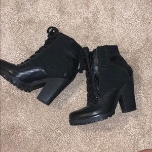 Heeled boots. Worn once. Size 7 and 1/2.